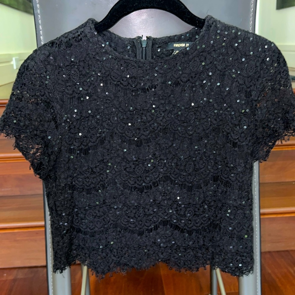 Lightly worn black sequin top